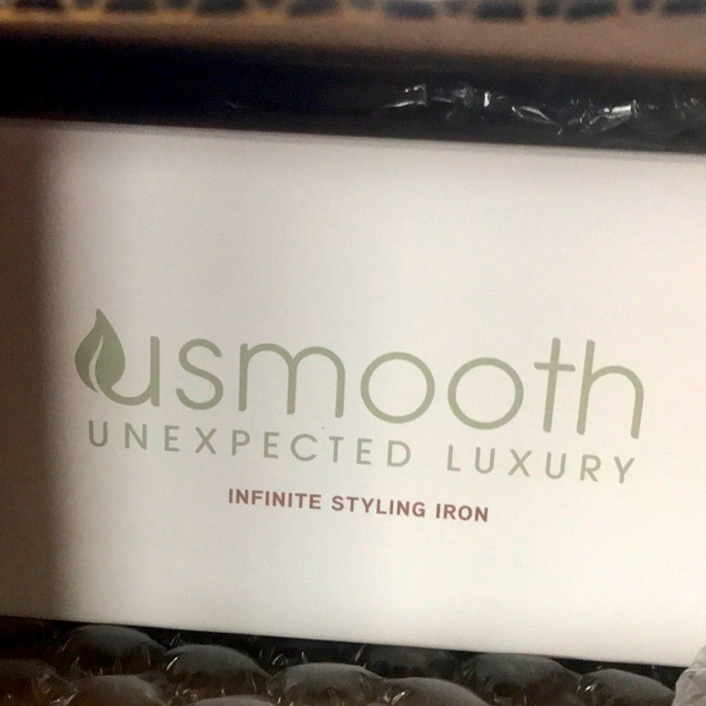 BRAND  NEW USMOOTH  INFINITE STYLING IRON